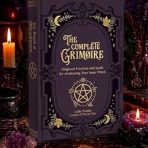 May include: A hardcover book titled "The Complete Grimoire" with a dark purple cover and gold lettering. The book features a pentagram and crescent moon design. The spine reads "The Book of Shadows". The book is surrounded by candles and crystals.