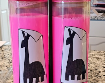 May include: Two pink reusable water bottles with cork lids and a black and white llama graphic on each bottle.