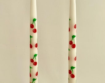 Taper candles hand painted cherries with leaves.  Slow burning 12 inch with cotton wick.  Gift for her. Made in USA
