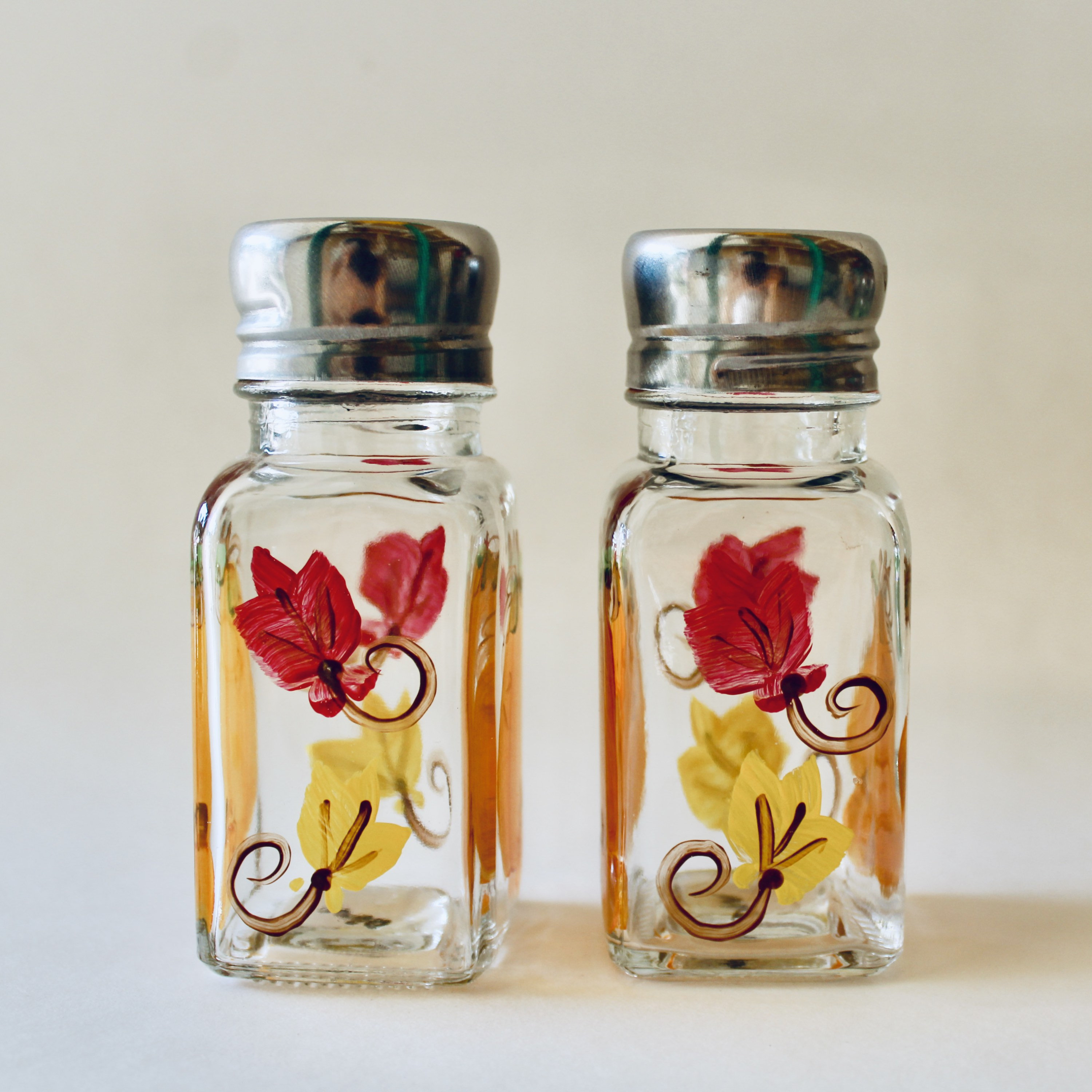 Hand painted Fall salt and pepper shakers. Pumpkins and leaves