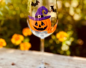 Halloween pumpkin wine glass. Hand painted.  Pumpkin witch with purple hat.  Jack O Lantern October birthday gift.  Fall decor.