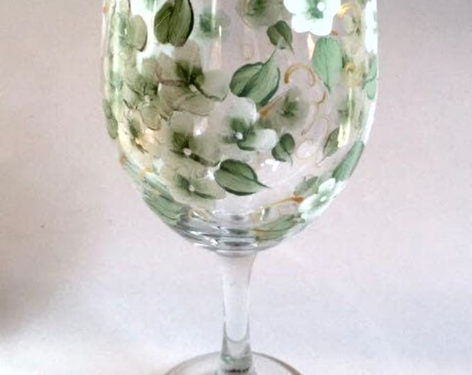 White hydrangeas wine glass with gold swirls hand painted, great for wedding favors, bridesmaid's gift. Gift for her.