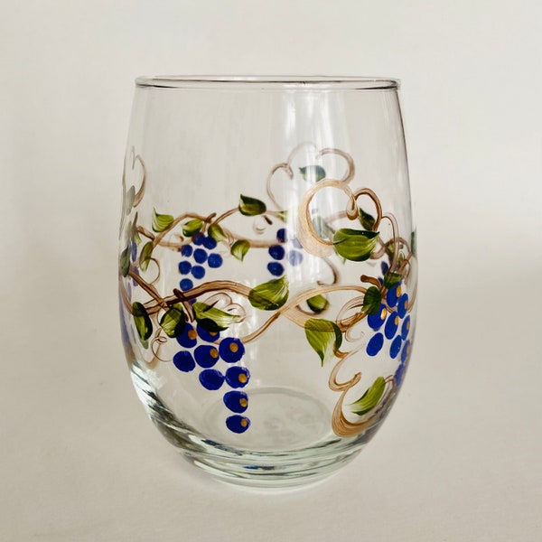 Stemless wine glass with hand painted grapes.  Large capacity 21 oz. Made in USA.