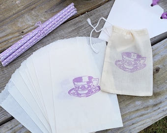 Lavender Tea Party mini kit, 8 stamped Tea Cup Goodie Favor bags, 12 Lavender polka dot straws, 3 tags with ribbon in a muslin stamped bag