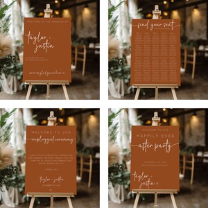May include: Four brown signs with white text on easels. The signs are for a wedding and include the wedding date, location, and the names "Taylor + Justin". The signs read "Welcome to the Wedding of Taylor + Justin", "Find Your Seat", "Welcome to Our Unplugged Ceremony", and "Welcome to Our Happily Ever After Party".