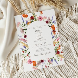 May include: Wedding invitation with a floral border. The invitation reads "Please join us in celebrating the wedding of Emily Grace Jones and James Michael Anderson 06 14 25 at 4 o'clock in the afternoon Sapphire Estate 164 Massapoag Avenue Sharon, Massachusetts dinner and dancing to follow"