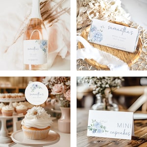 May include: A bridal shower party set featuring a blue and white floral design. The set includes a bottle of champagne with a personalised label, a chocolate bar with a personalised label, a cupcake topper, and a sign for mini cupcakes.