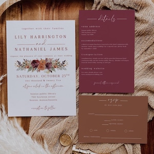 Puede incluir: Un conjunto de invitaciones de boda en blanco, burdeos y marrón. La tarjeta principal anuncia la boda de Lily Harrington y Nathaniel James, con decoraciones florales y detalles del evento. El conjunto incluye tarjetas RSVP y de detalles.