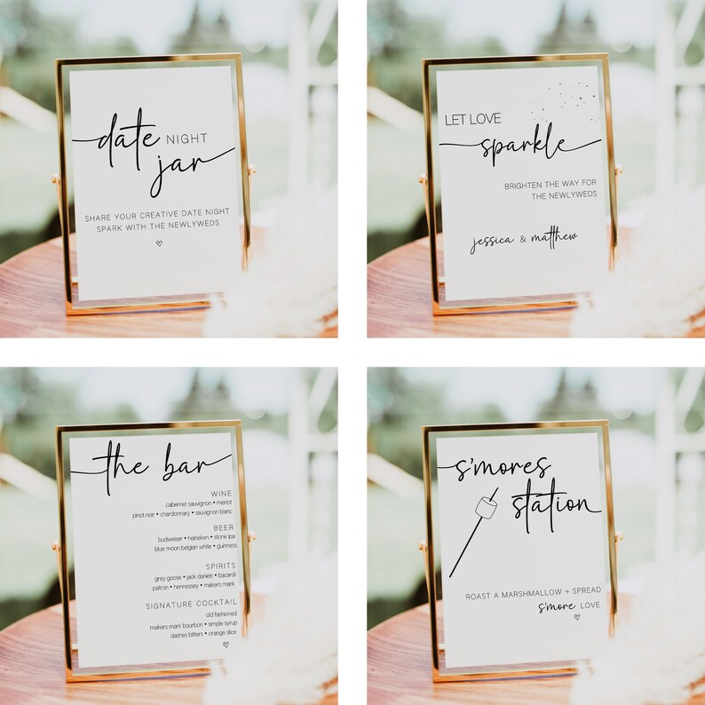 Pu&ograve; includere: Quattro cartelli con cornice dorata, sfondo bianco e testo nero. I cartelli sono per un ricevimento di nozze e includono il testo "date jar", "let love sparkle", "the bar" e "s'mores station".