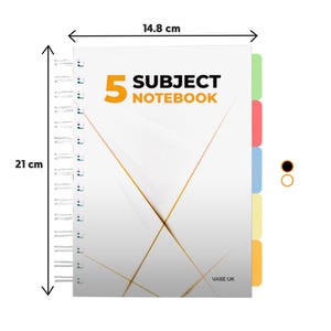 May include: A white notebook with a gold design and the text "5 SUBJECT NOTEBOOK" in orange. The notebook has five colour-coded tabs on the right side and measures 14.8 cm by 21 cm.