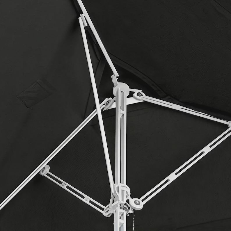 May include: A black outdoor umbrella featuring a white central pole and a white articulated support frame. The canopy is made of solid black fabric, and the mechanical structure includes white struts and joints that connect to the central pole.