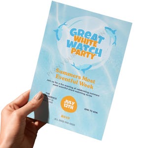 Puede incluir: Un folleto azul claro con el texto "Great White Watch Party" e ilustraciones de tiburones. El folleto tambi&eacute;n incluye el texto "Summers Most Eventful Week" y detalles del evento para el 12 de julio.