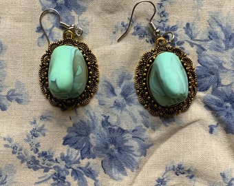 Hand sculpted mint green and translucent swirl penis earrings
