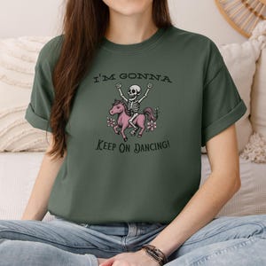 Vintage Pink Pony Skeleton T-Shirt: Fun Halloween Graphic Tee