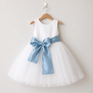 Girls in White Dresses With Blue Satin Sashes