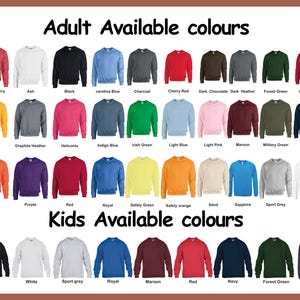 May include: A color chart displaying various crewneck sweatshirts for adults and kids. The text reads Adult Available colours and Kids Available colours. Each sweatshirt is labeled with its specific color name, including red, black, blue, green, and grey.