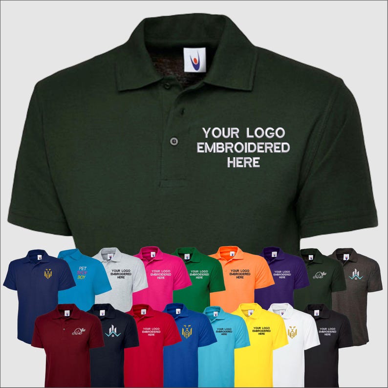May include: A variety of polo shirts in different colors, including navy blue, light blue, white, pink, red, green, orange, yellow, purple, black, and gray. The shirts have a small logo embroidered on the left chest. The text "YOUR LOGO EMBROIDERED HERE" is embroidered on the right chest of a dark green polo shirt.