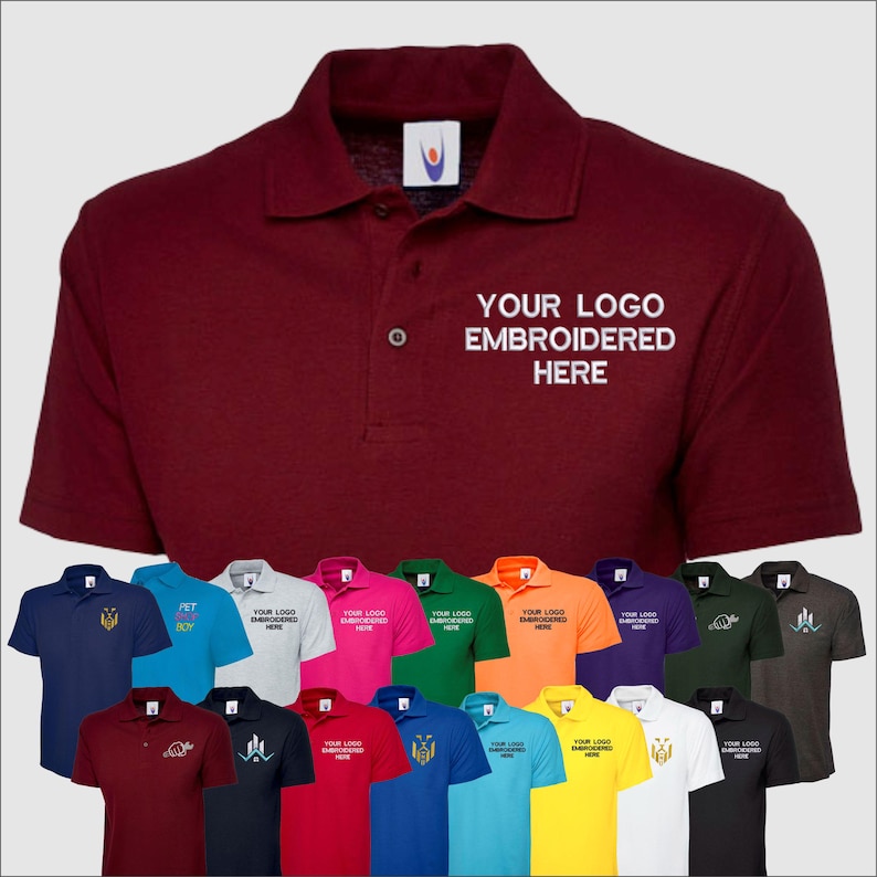 May include: A variety of polo shirts in different colors, including navy blue, turquoise, gray, pink, green, orange, purple, dark green, brown, maroon, black, red, blue, light blue, yellow, and white. The shirts have a small embroidered logo on the left chest and the text "YOUR LOGO EMBROIDERED HERE" on the right chest.