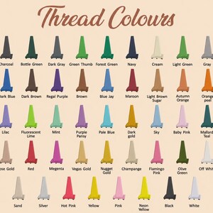 May include: A color chart titled Thread Colours displaying forty-five individual thread spools in various shades including charcoal, green, blue, brown, purple, orange, pink, gold, yellow, black, and white, each labeled with its specific color name.