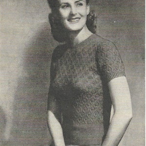 May include: A vintage knitting pattern for an economy jumper, knitted in fancy stitch. The pattern calls for 4 ounces of 2-ply wool. The pattern is from Bestway Leaflet 977.