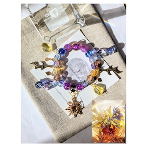 崩壊スターレールをイメージしたブレスレット、ファイノン・カスラナブレスレット、サンコアフレイムファンタジーギフトウィングチャーム、パープルイエローガラスビーズ、ストレッチフィット