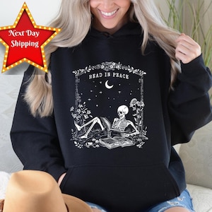 Read in Peace Sweatshirt, Skeleton Reading Book Lover Sweatshirt, Bookish Halloween Shirt for Spooky Season,Book Lover Halloween Sweatshirt