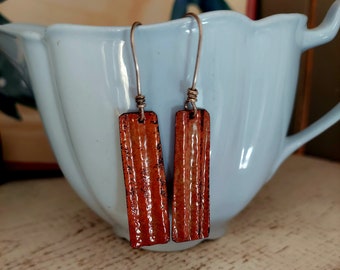 Burnt orange enamel dangle earrings