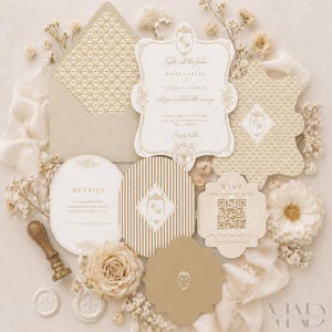 May include: A cream and gold wedding invitation suite. The set includes various card shapes, an envelope, and RSVP cards. Floral accents and a wax seal enhance the design. The invitation features the names Katie Carter and Nicolas Lewis.