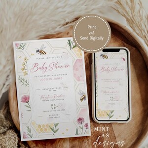 May include: Baby shower invitation with floral and honeycomb design. The invitation includes the text "Baby Shower" and details for Jocelyn Jones. A smartphone displays the same design. The words "Print or Send Digitally" are also present.