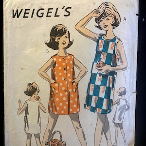 May include: Vintage Weigel's sewing pattern size 8. The pattern features illustrations of women's dresses with different designs. One dress is orange with white polka dots, and another is blue and white checkered with orange bows. The pattern is from the 1960s.