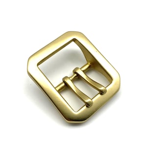 May include: A gold-toned metal buckle with a square frame and a double prong closure.