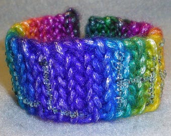 STILL HERE crocheted cuff with glow-in-the-dark beadwork