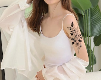 Tijdelijke tatoeages met zwarte bloemen, bloemenmotief
