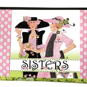 May include: Pink and white checkered fabric cosmetic bag with a zipper closure and a black handle. The front of the bag features a colorful illustration of two women wearing hats and the text "SISTERS".