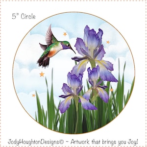 May include: A 5 inch round circle design featuring a hummingbird hovering near purple iris flowers with yellow centers. The background is a light blue sky with white clouds and yellow stars.
