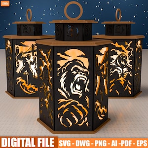 May include: Three hexagonal lanterns made of black material with intricate cutouts depicting a roaring gorilla. Each lantern features a top circular handle and emits a warm orange glow from within, showcasing detailed scenes of the gorilla in action.
