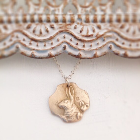 Items similar to bronze rabbit necklace on Etsy