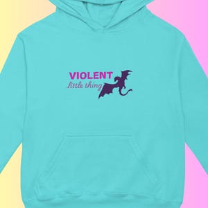 May include: A turquoise blue hoodie with a purple dragon graphic and the text "VIOLENT little thing" printed on the front.