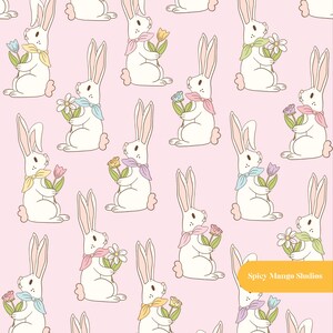 May include: A seamless pattern featuring white bunnies wearing colorful scarves and holding flowers on a pink background. The text "Spicy Mango Studios" appears in the bottom right corner of the pattern.