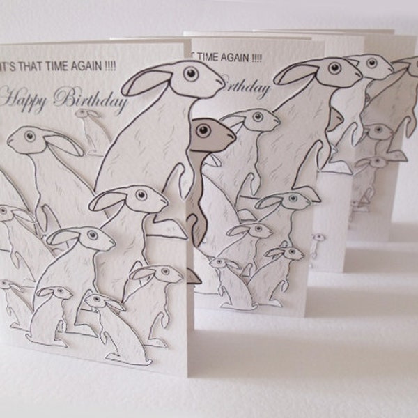 Its That Time Again  Happy Birthday Handmade Card in White with lots and lots of Grey Hares  READY TO SHIP