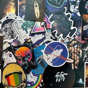 Set de pegatinas del espacio exterior: diseños de galaxias, planetas y astronautas