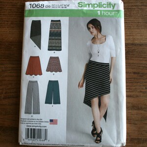 May include: A sewing pattern for a skirt with different styles. The pattern is for sizes 30-38 and includes instructions for a 1-hour project. The pattern is from Simplicity and has the number 1068 D5 on it.