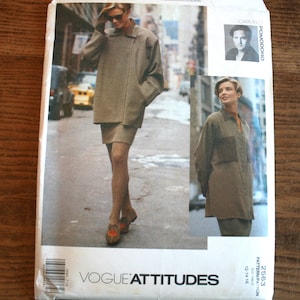 May include: A sewing pattern for a long-sleeved shirt and a skirt. The pattern is called "Vogue Attitudes" and the number is 2563. The pattern is for sizes 12-16.