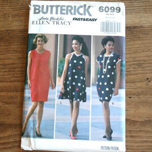 May include: A sewing pattern for a dress, featuring three models wearing different versions of the dress. The pattern is from Butterick and is for sizes 12-14-16. The dress is sleeveless and has a scoop neck. The models are wearing the dress in red, black and white polka dots, and blue and white polka dots.
