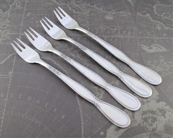 Four Vintage Northland Stainless Seafood Forks