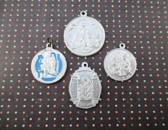 Four Little Vintage Aluminum Religious Amulets - image 1