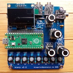 May include: A blue printed circuit board labelled scarp v2.0 with a green Raspberry Pi Pico microcontroller, a black rectangular display, four black rotary knobs with white indicators, eight push buttons, and five blue LEDs. Text reads blueprint@poetaster.de 2026.