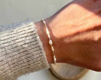 Handmade beaded bracelet made of small green and white freshwater pearls, perfect everyday bracelet