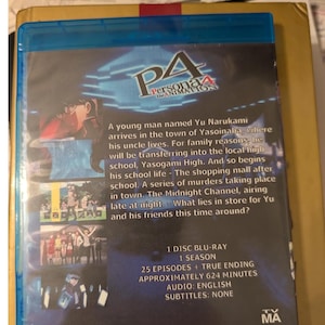 May include: A blue Blu-ray case for Persona 4 The Animation featuring a dark blue background with character imagery and a plot summary. The back cover lists 1 disc, 1 season, 25 episodes plus the true ending, 624 minutes, English audio, and no subtitles.