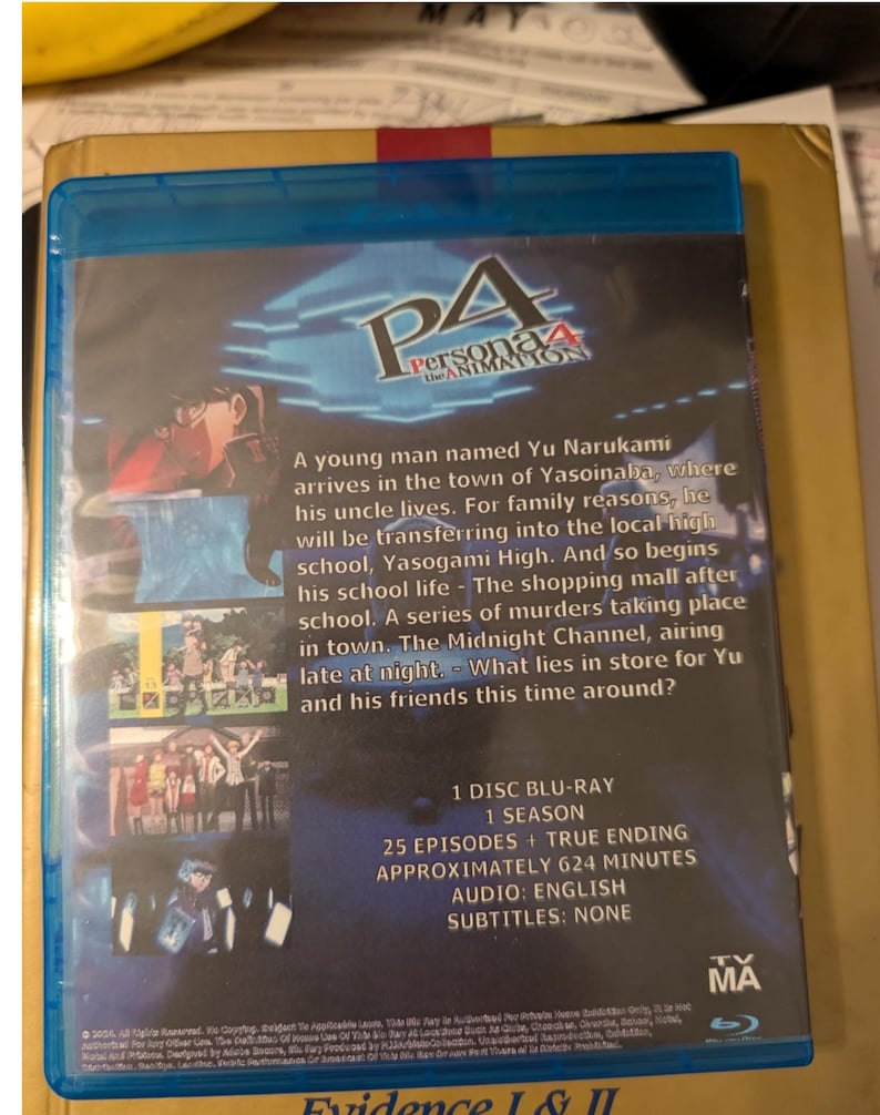 May include: A blue Blu-ray case for Persona 4 The Animation featuring a dark blue background with character imagery and a plot summary. The back cover lists 1 disc, 1 season, 25 episodes plus the true ending, 624 minutes, English audio, and no subtitles.